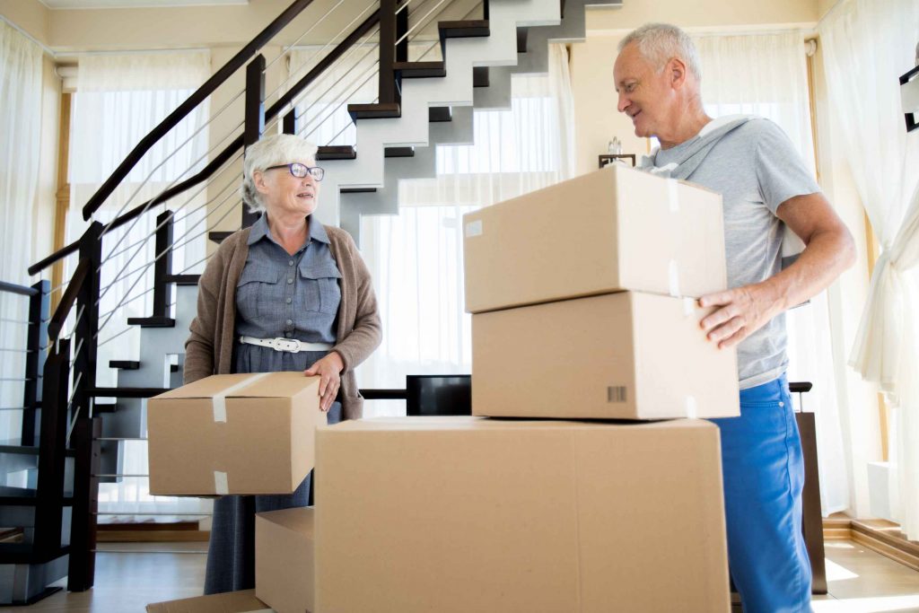 Old couple packing